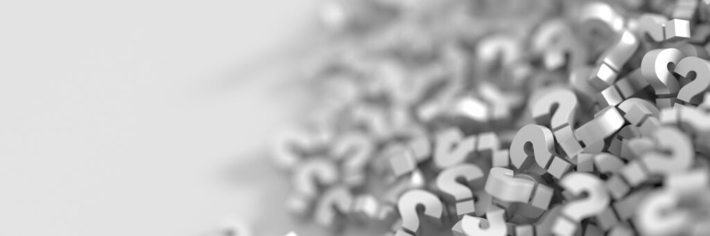 close-up of silver questions marks